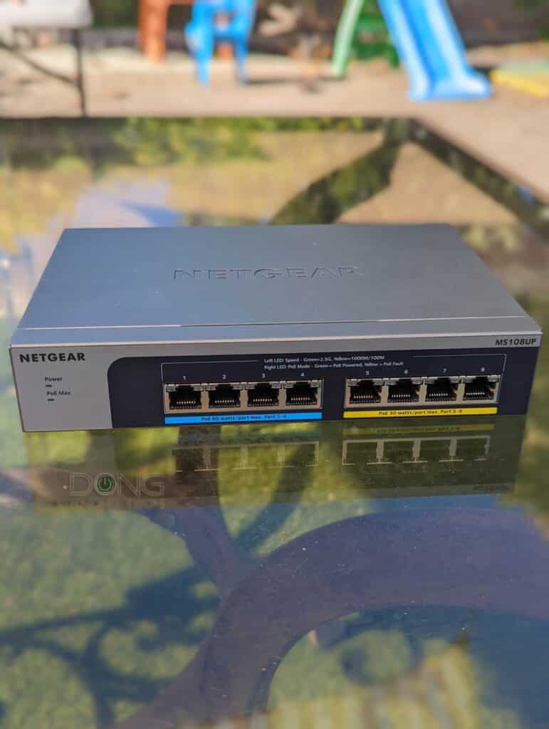 Netgear MS108UP 8 port Multi-Gigabit 2.5G Ultra60 PoE Ethernet Plus Switch on Table