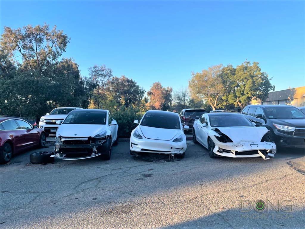 Tesla cars at body shop