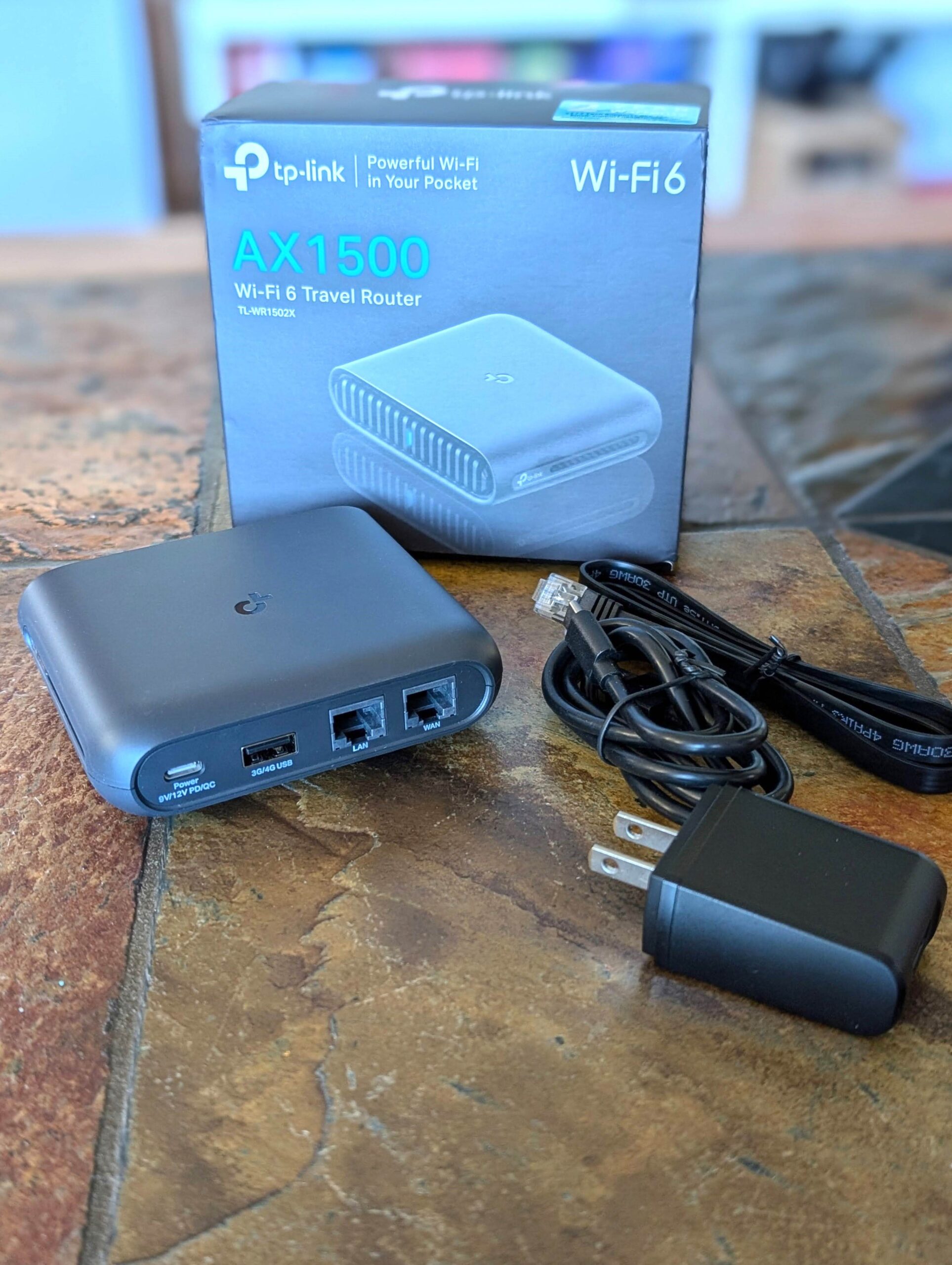 The TP-Link TL WR1502X comes with a USB C charger