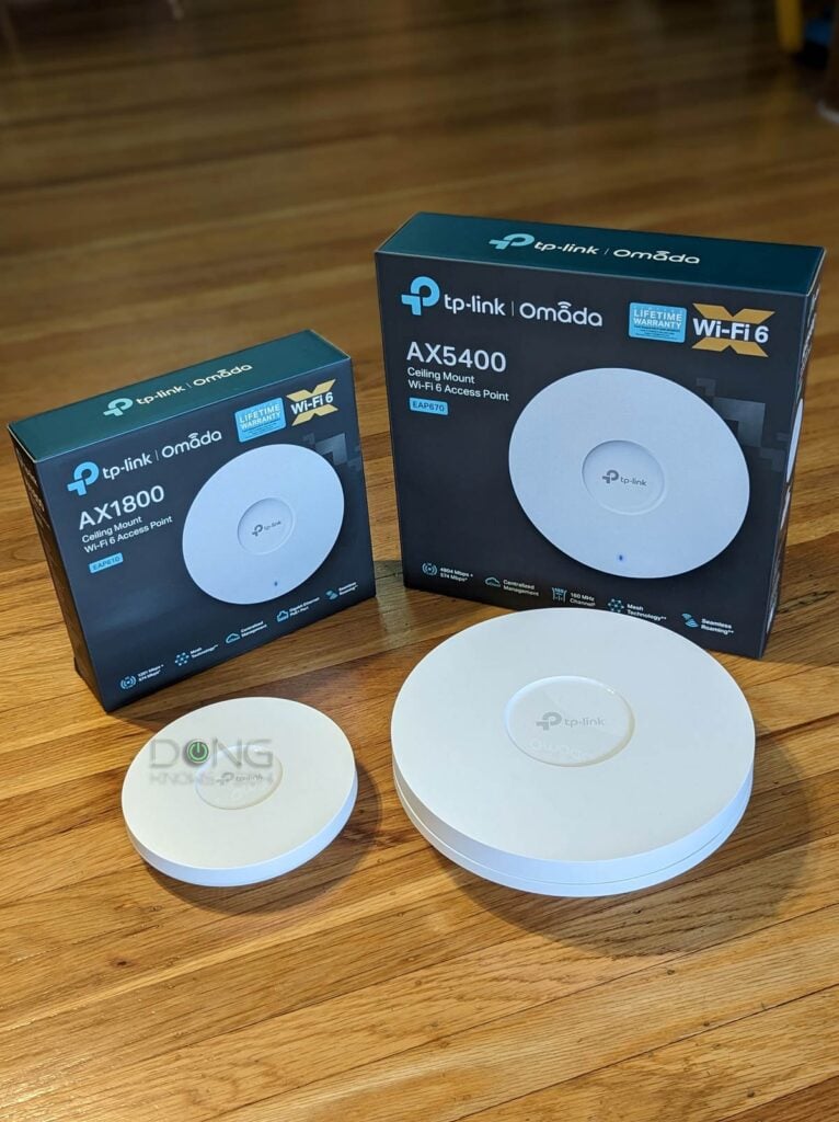 TP-Link Omada EAP670 vs. EAP610: The access points and their retail boxes.